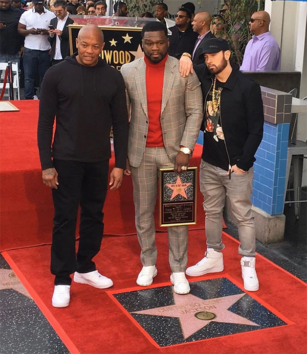 L to R: Dr. Dre, 50 Cent and Eminem at 50 Cent's star ceremony | Photo: Walk of Fame