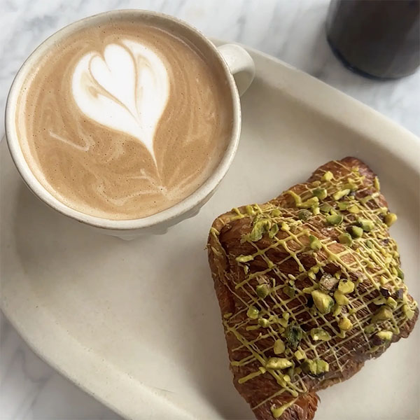 Photo: Coffee and Pistachio Croissant at Pantheon Coffee