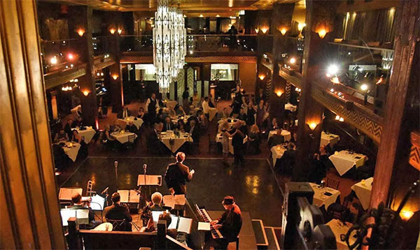 A couple dances at Cicada Restaurant | Photo: Cicada